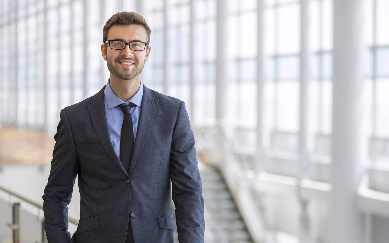 Man in suit smiling