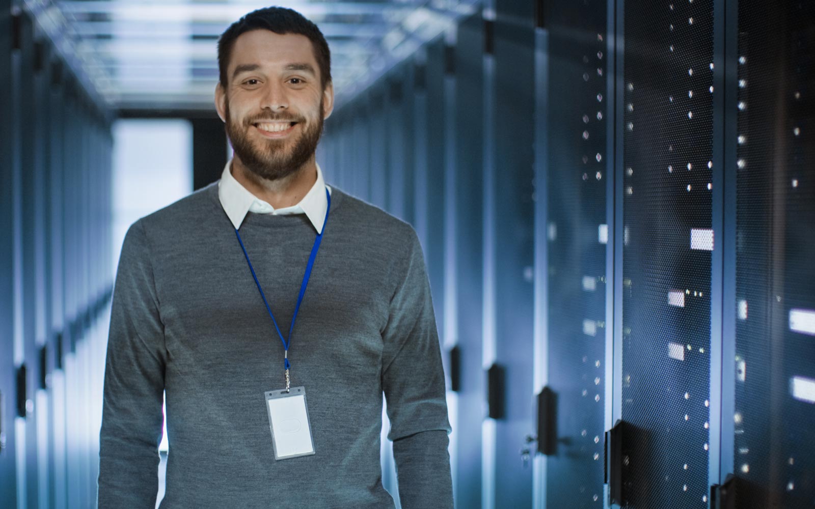 Cloud technician standing in server room