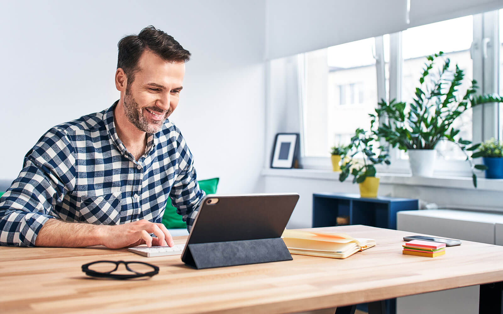 Healthcare systems engineer working at his desk