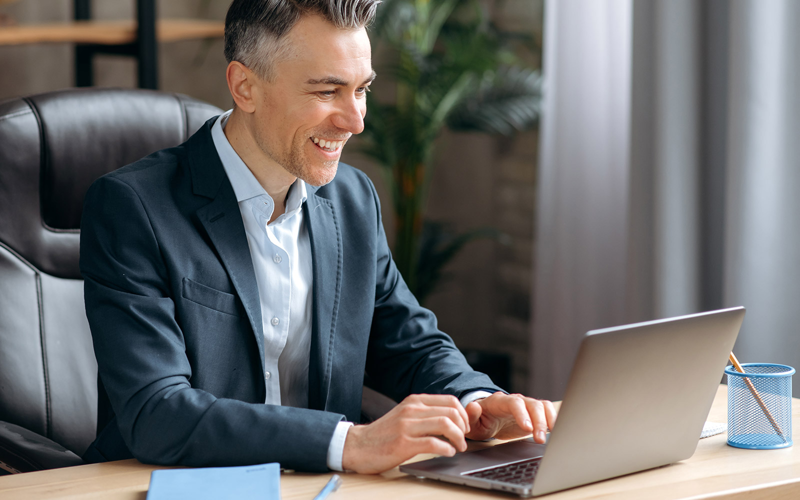 Business manager working at his desk
