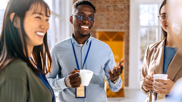 Group of diverse professionals casually chatting