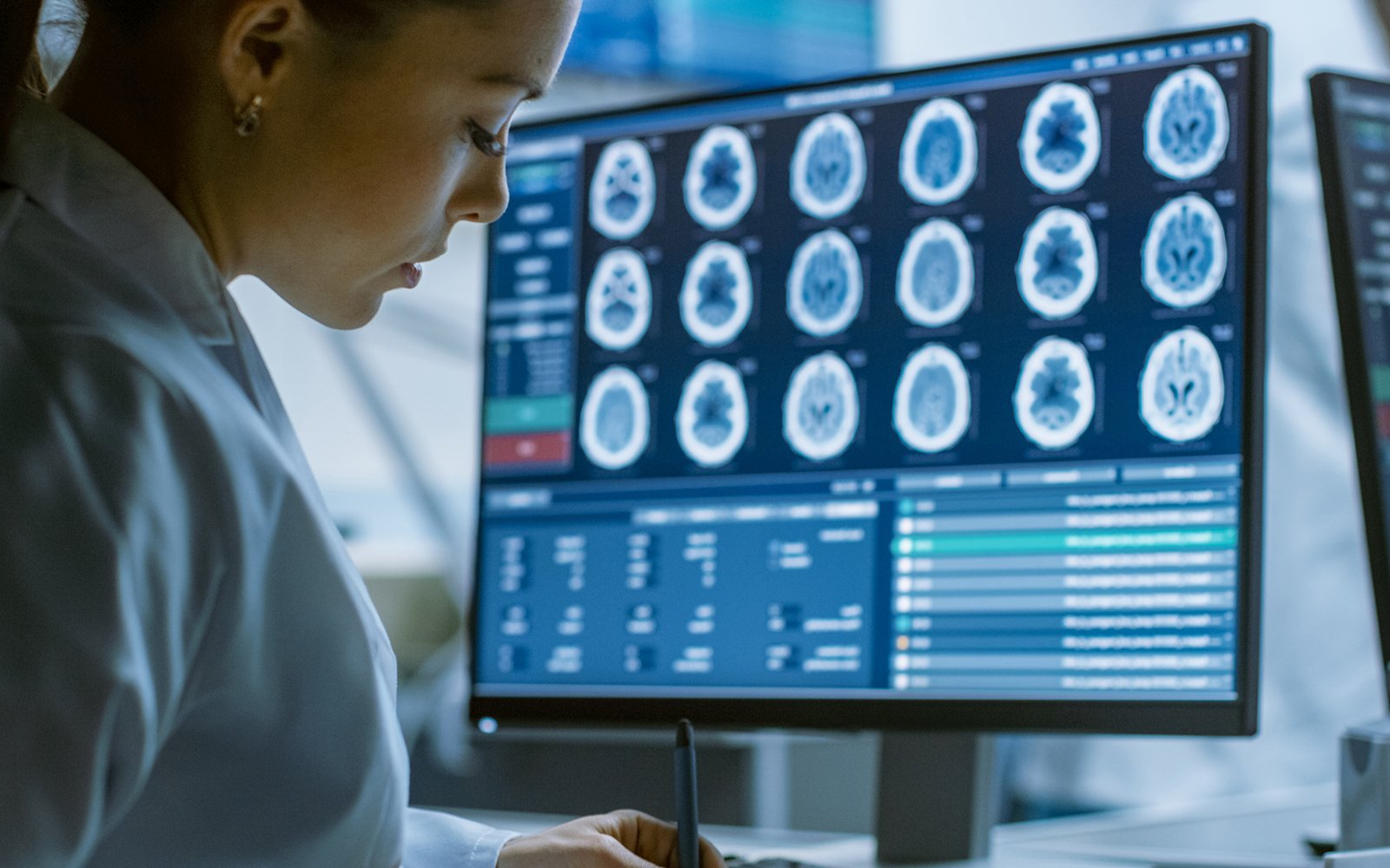 Healthcare professional reviewing medical imaging