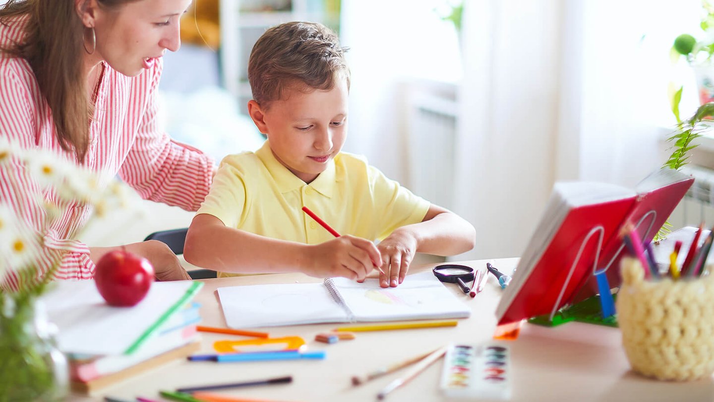 teacher working with a child
