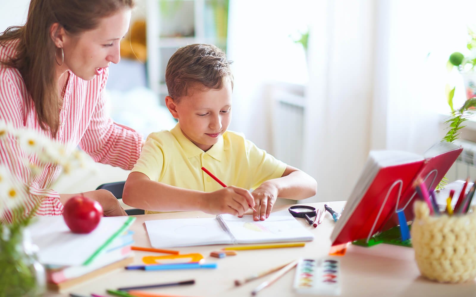 teacher working with a child