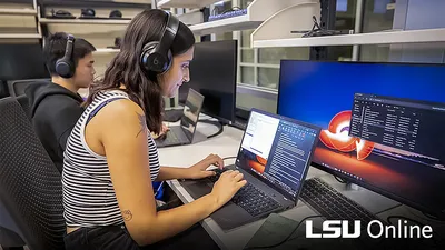 LSU MS in Computer Science students on laptops