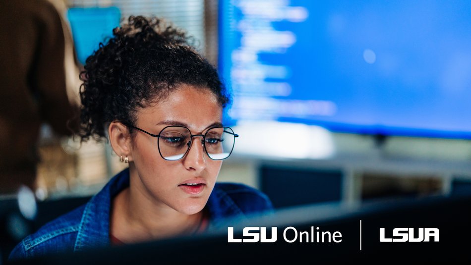 Student with an AI minor sitting in front of a computer