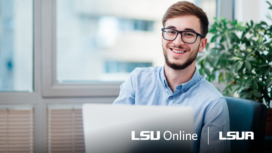 Criminal Justice student at laptop