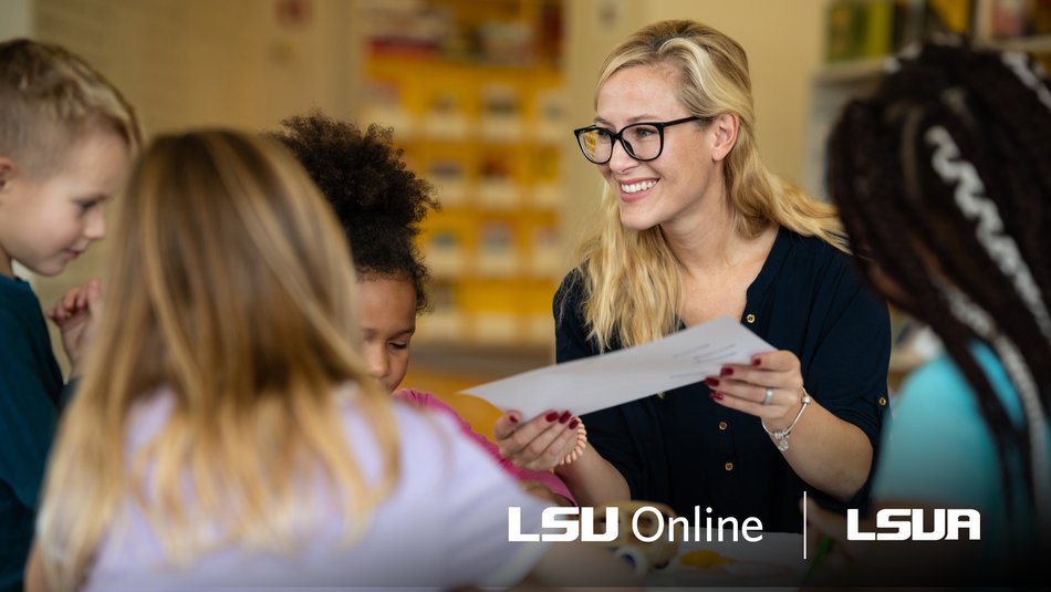 Female teacher engaging with elementary school children.