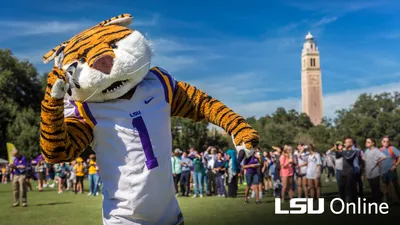 Mike the Tiger Mascot in front of the LSU A&M bell tower