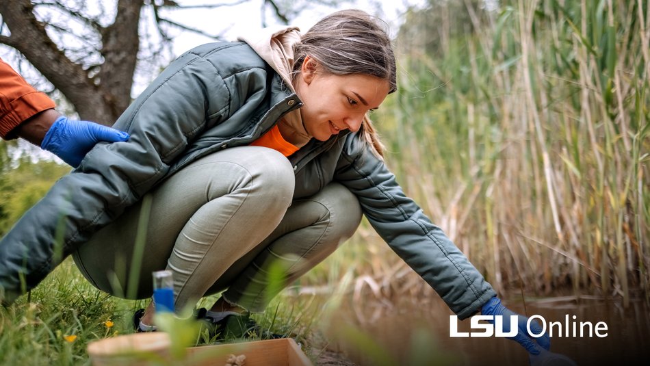 Environmental Science student gathering river water in a tube
