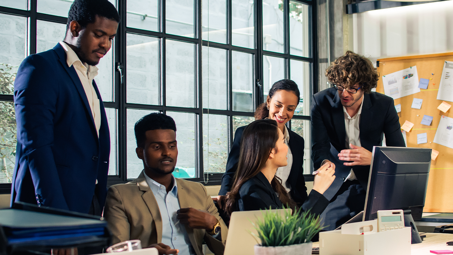 Group of professionals talking at table