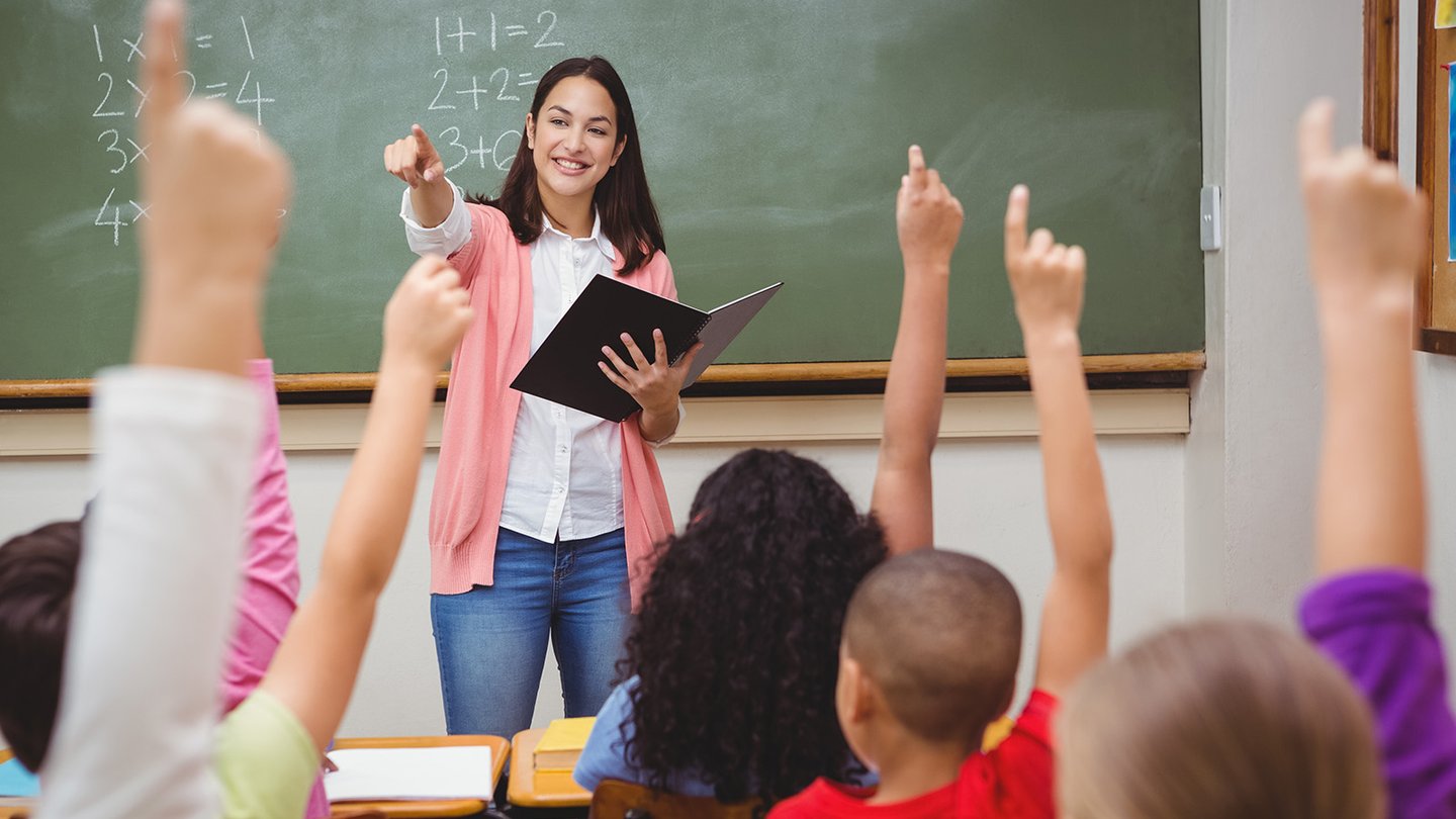 Teacher instructing students in classroom