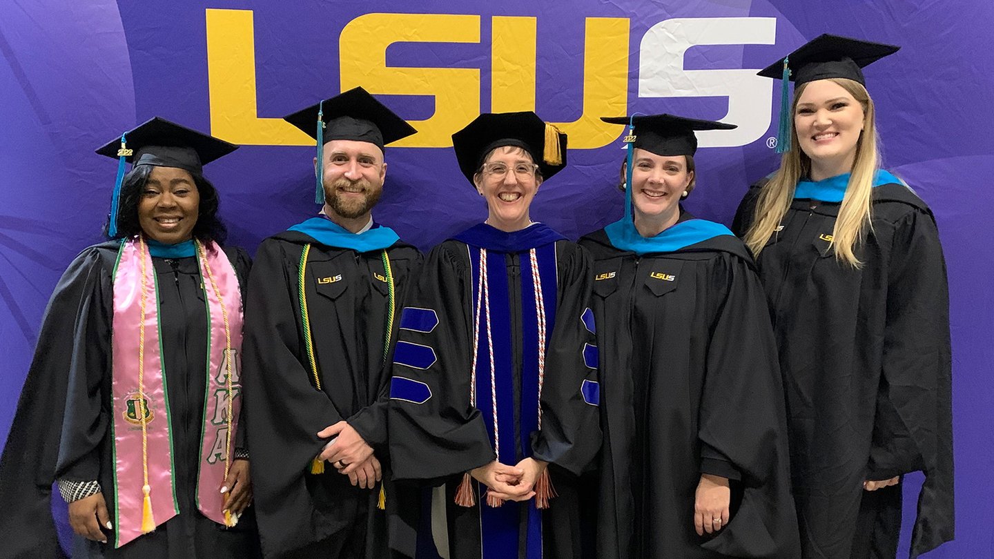 LSUS graduates pose for a photo