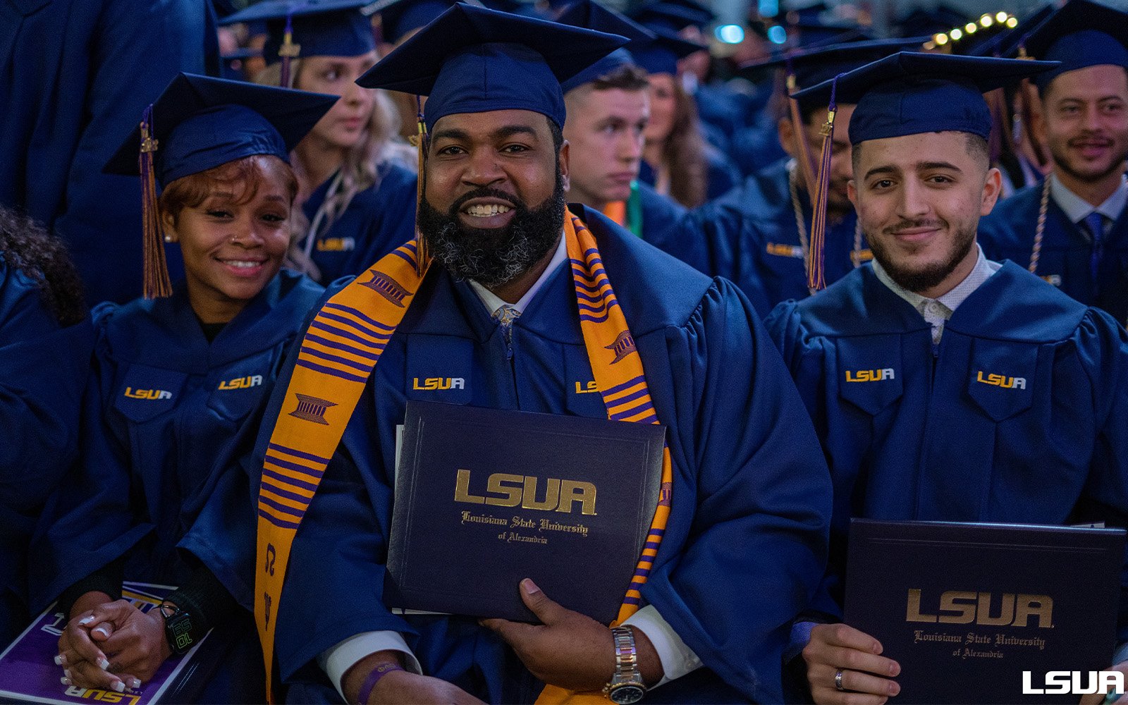 LSUA Graduate with diploma