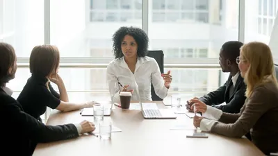 Group of professionals in a board room