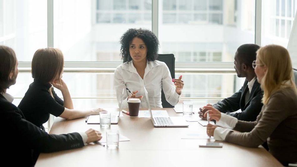 Group of professionals in a board room