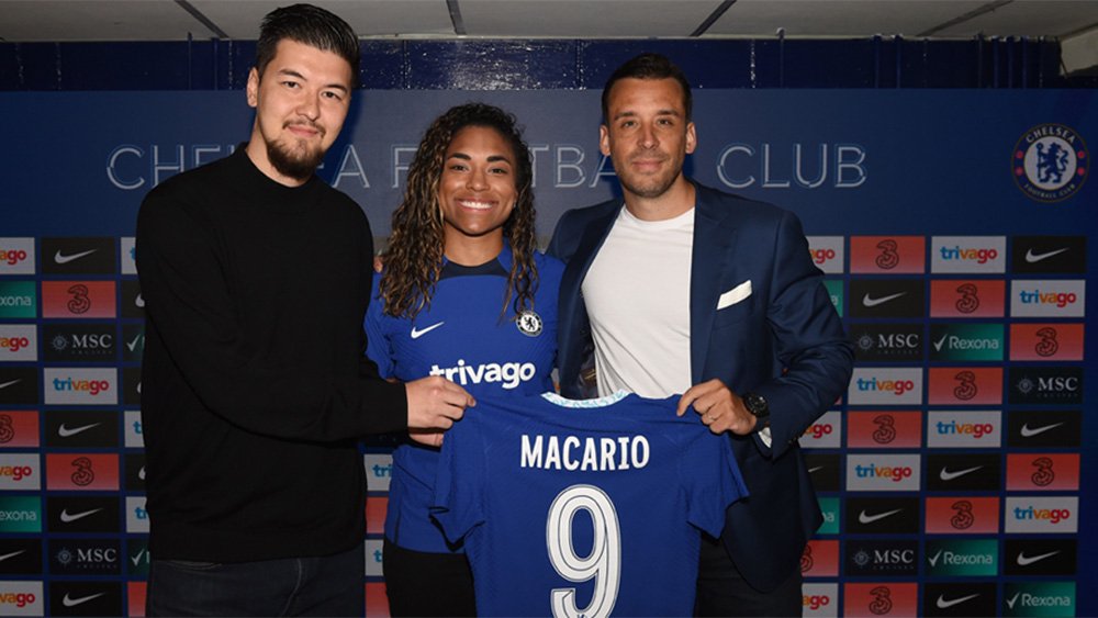 LSUS graduate Takumi Jeannin stands with Chelsea’s Catarina Macario