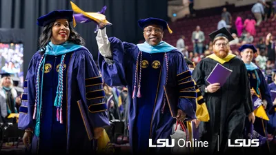 Graduates walking at a graduation