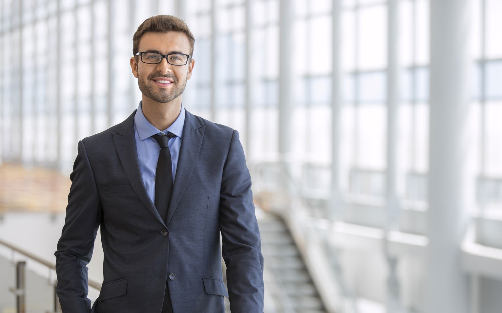 Man in suit smiling
