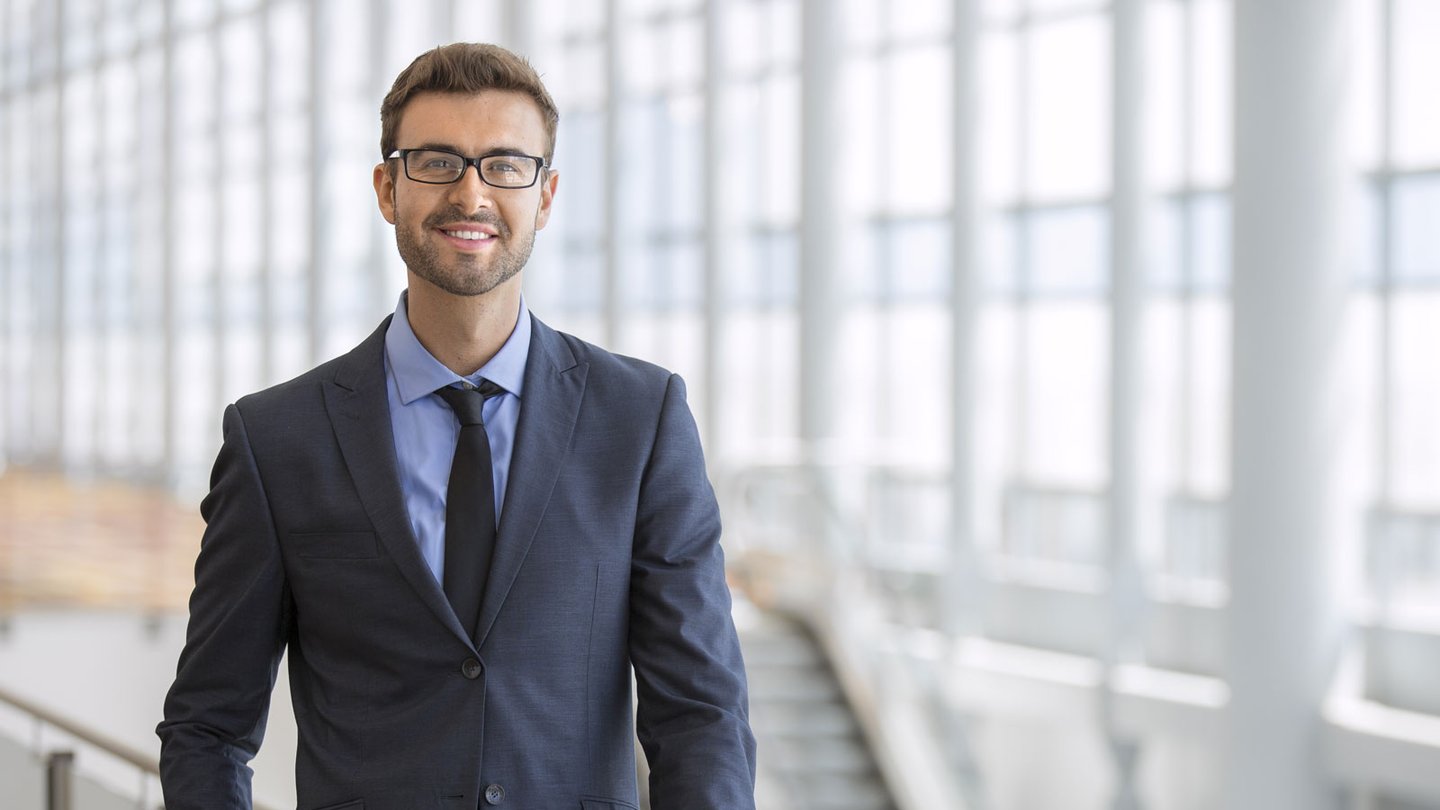 Man in suit smiling