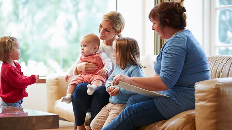 Social Worker with helping a family