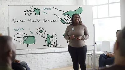 Woman leading public health seminar