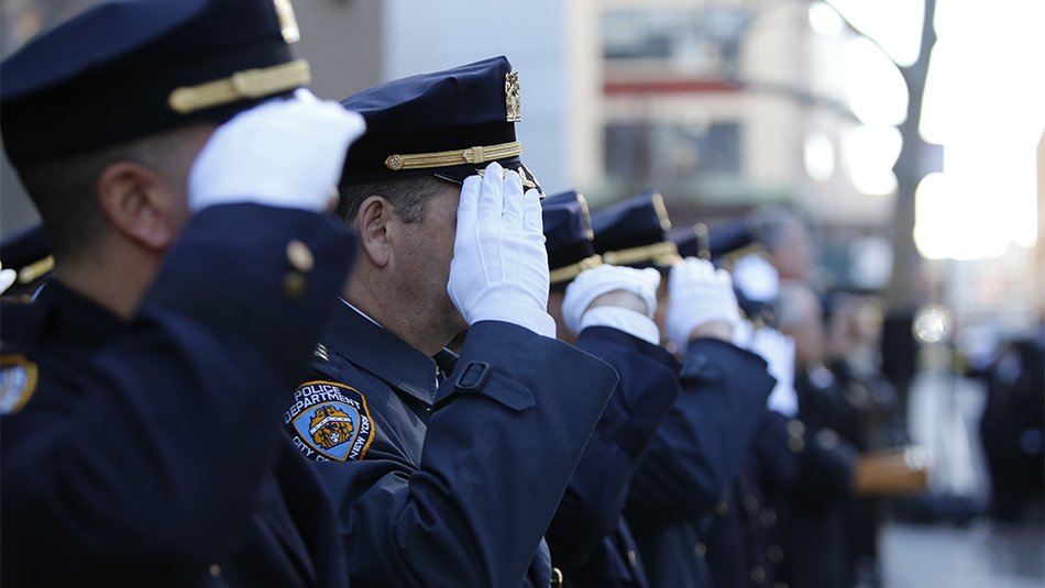 Police officers saluting