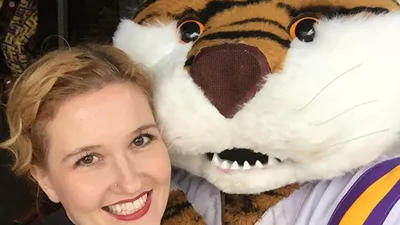 Dr. Sasha Thackaberry with mascot.