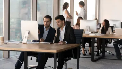 Two sports managers talking.