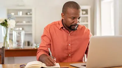 Man Studying for his Online Degree