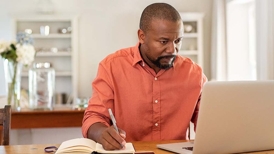 Man Studying for his Online Degree