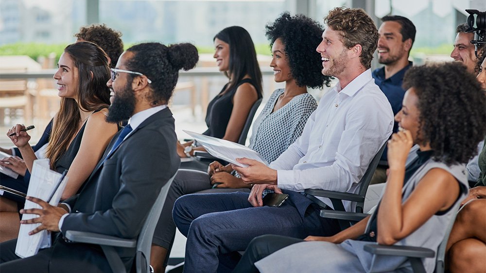 Employees sitting in office