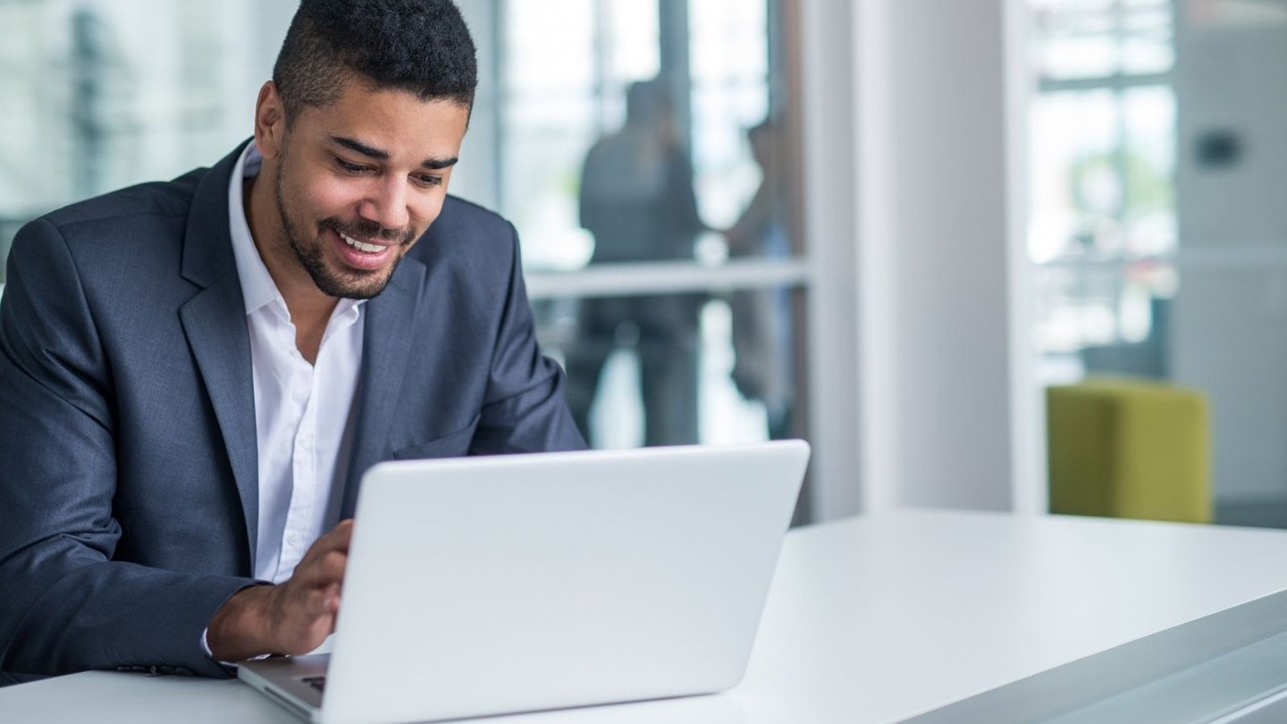 Business professional using laptop