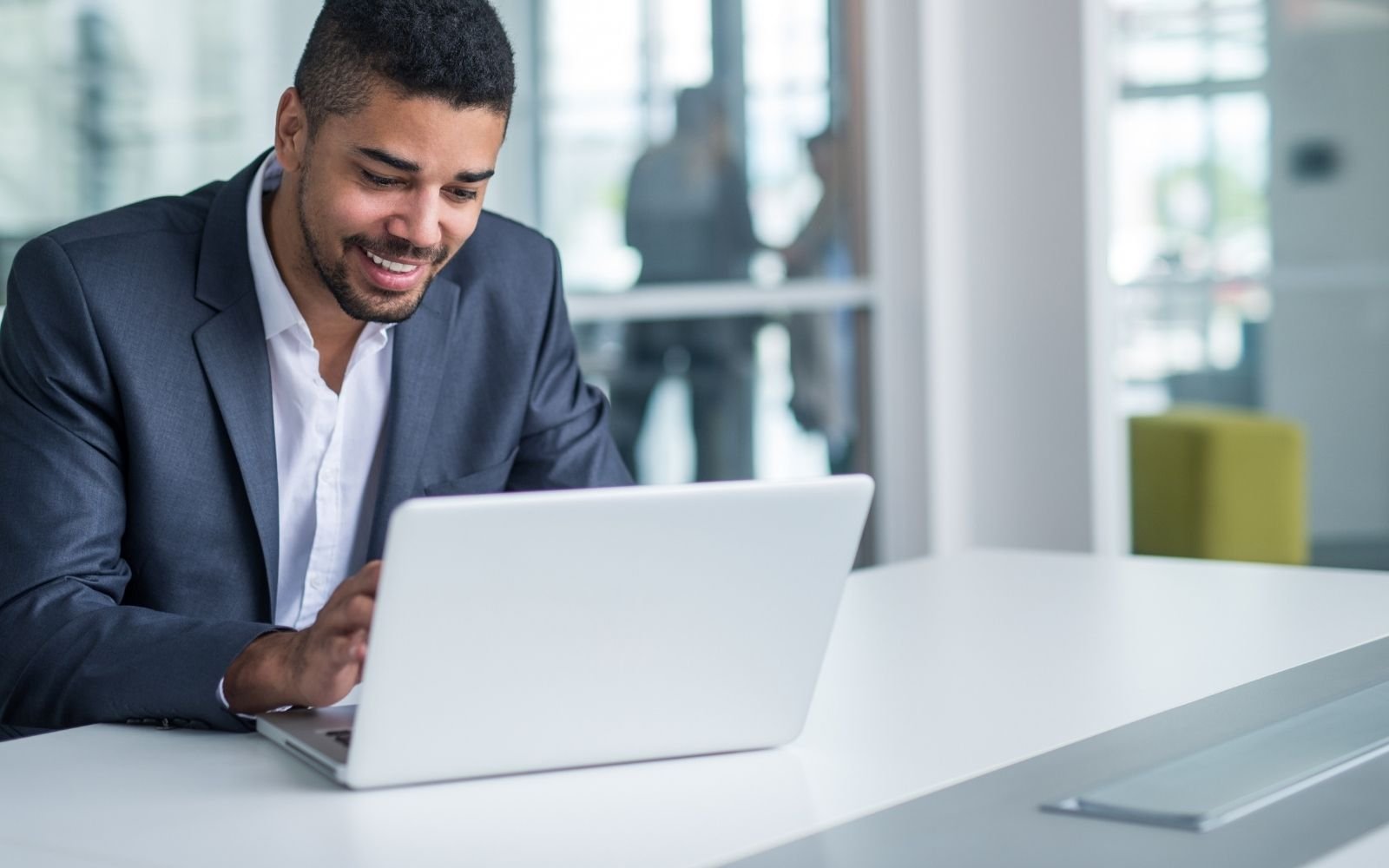 Business professional using laptop