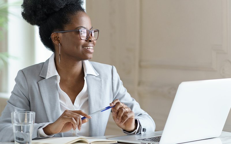 Business woman working at her desk