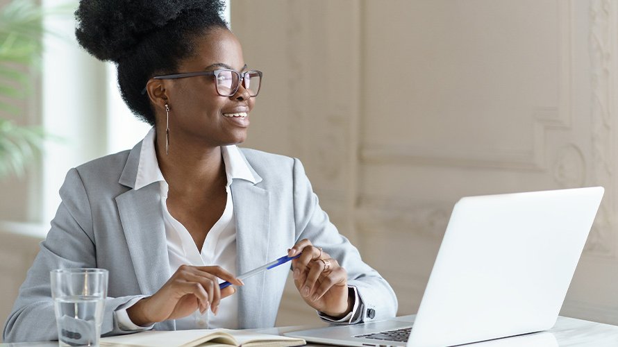 Business woman working at her desk