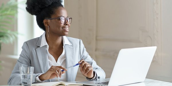 Business woman working at her desk