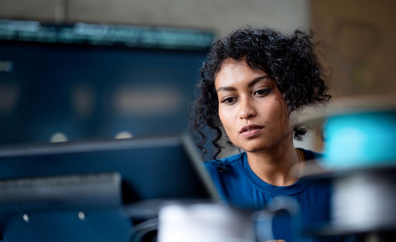 Woman researching on laptop