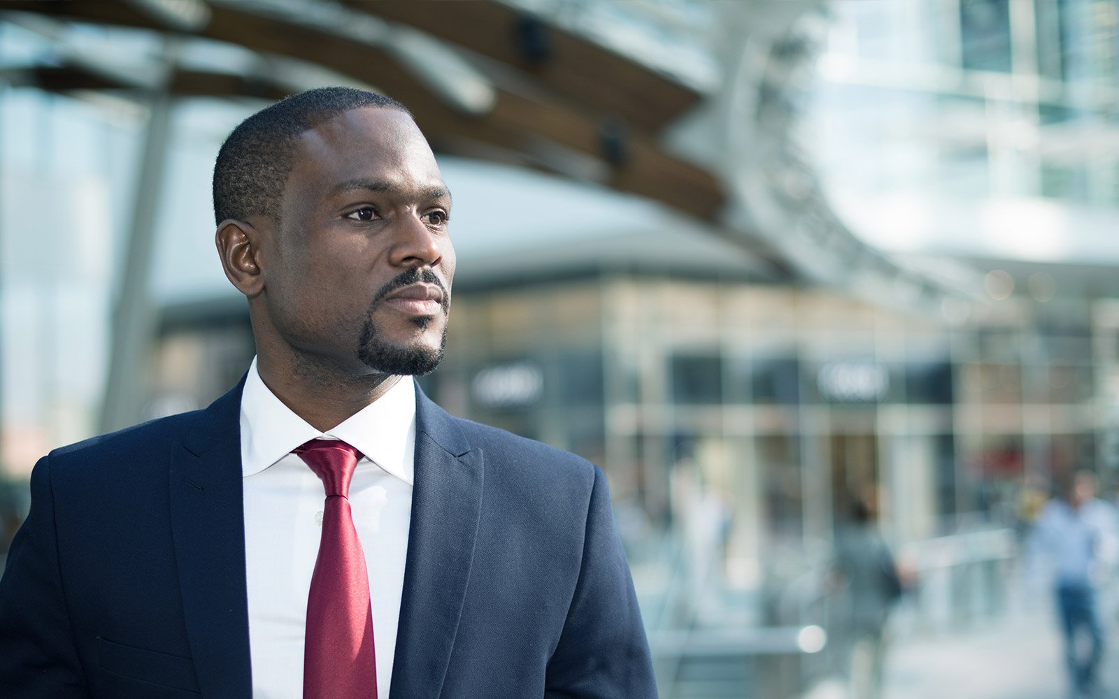 Man in suit standing in front of court