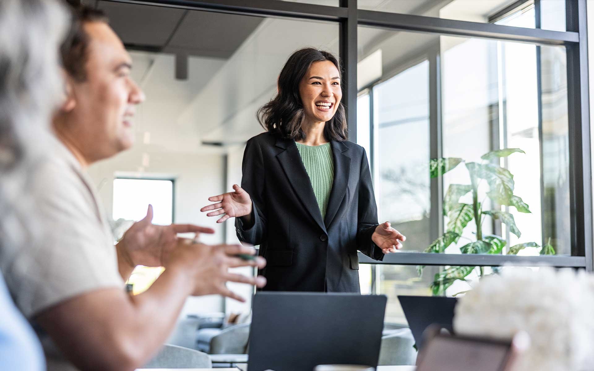 Professional woman presenting in office