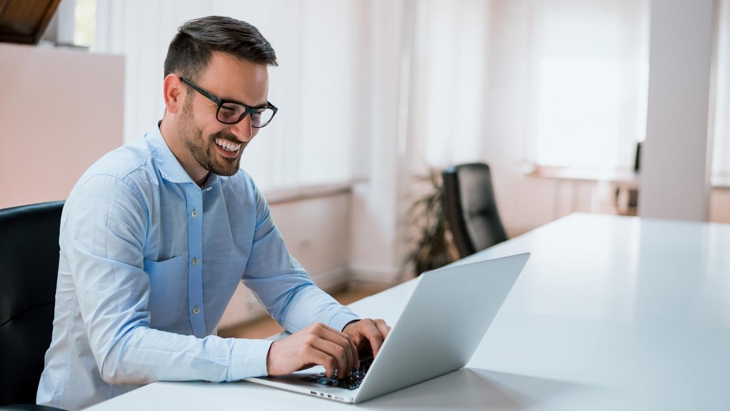 Facility manager working on his laptop