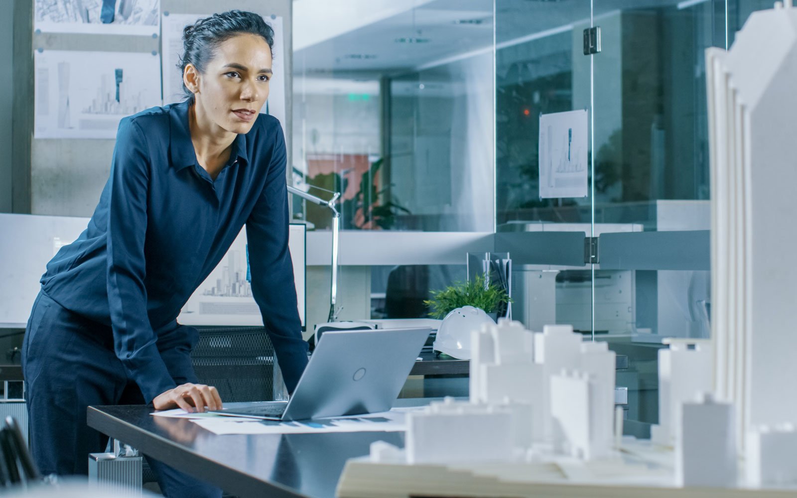 Engineers viewing computer models