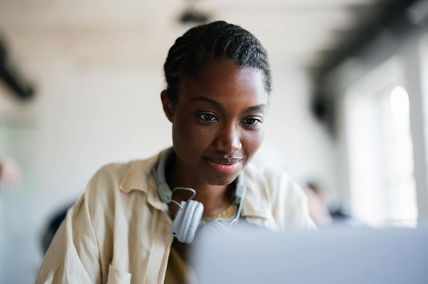 Student watching laptop