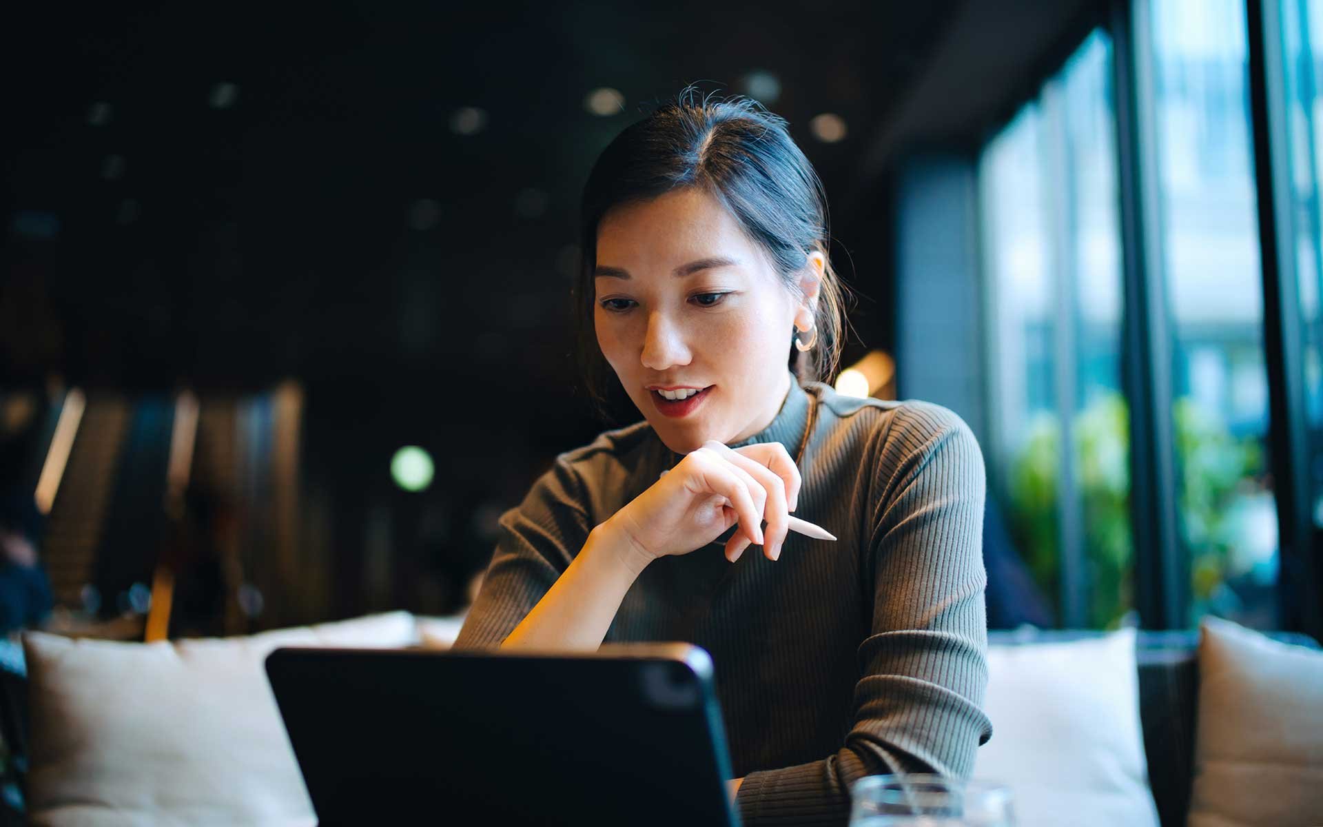 Woman using laptop for online learning